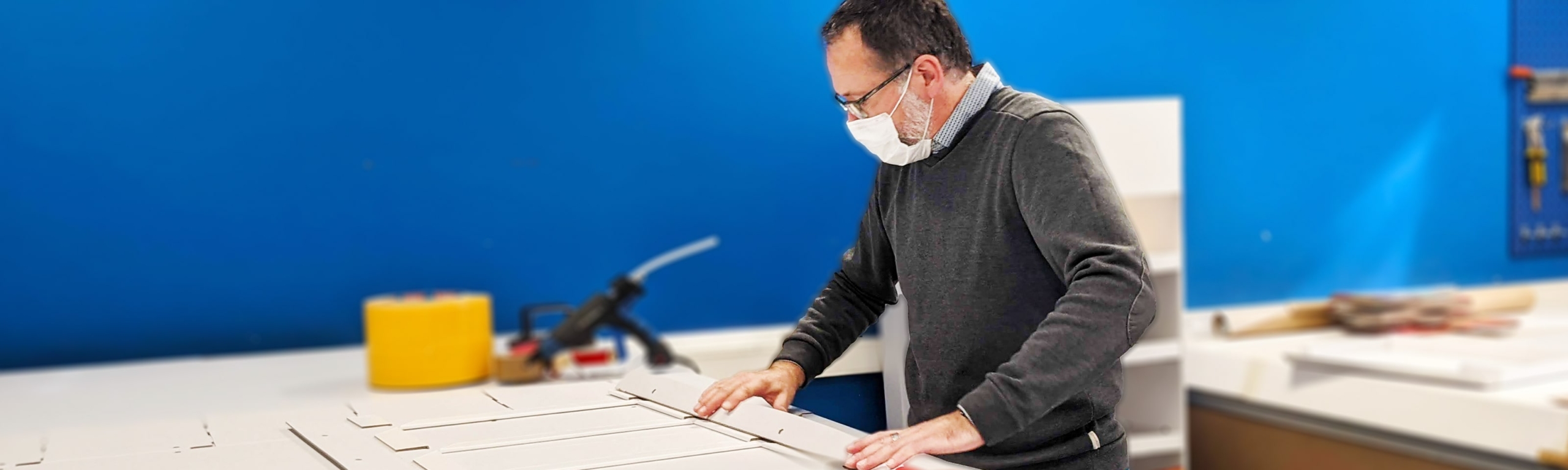 A designer from the Smurfit Kappa Drogenbos team at work with a point of sale display.